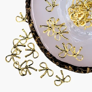 Kynsikoriste, Metallic Bows